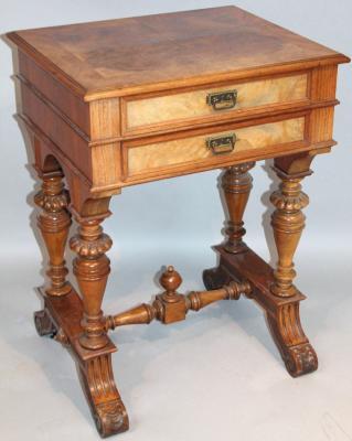 An early Edwardian walnut sewing table