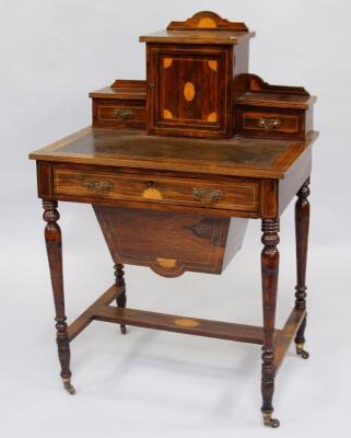 A Victorian lady's rosewood and satinwood inlaid sewing cum writing table