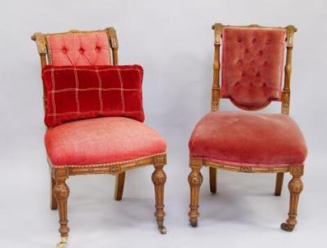 A pair of French style oak chairs