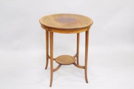 An Edwardian mahogany and boxwood line inlaid circular occasional table