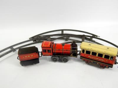 A tin plate clockwork express train set