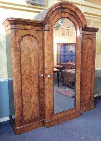 A Victorian figured walnut breakfront wardrobe