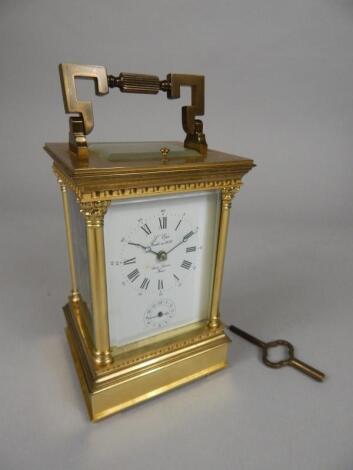 A modern brass carriage clock