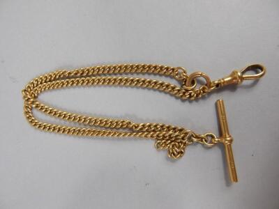 An 18ct gold watch chain with T bar