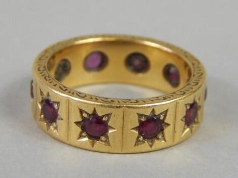 An 18ct gold garnet ring