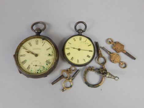 Two silver pocket watches and advertising keys