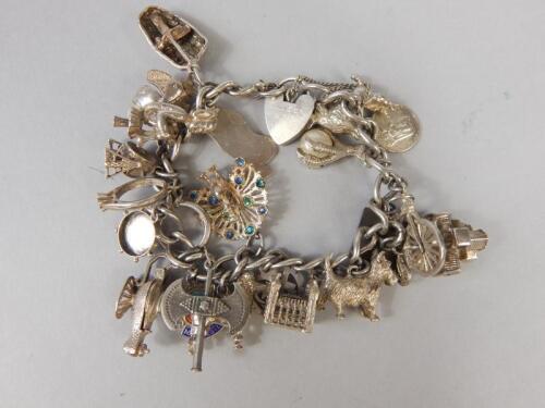 A white metal charm bracelet