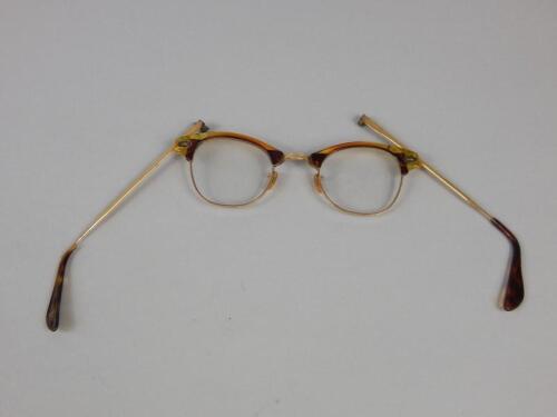 A pair of simulated tortoiseshell spectacles