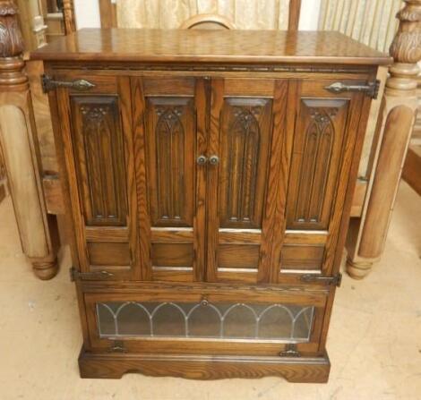 An Old Charm oak television cabinet