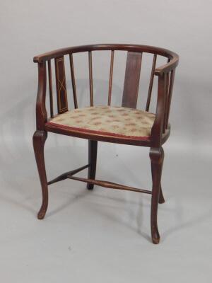 An Edwardian mahogany and boxwood strung tub chair