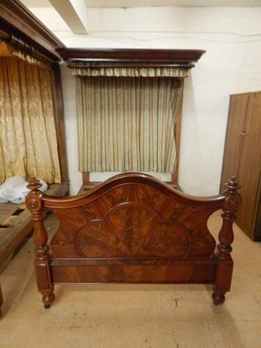 A Victorian mahogany half tester bed