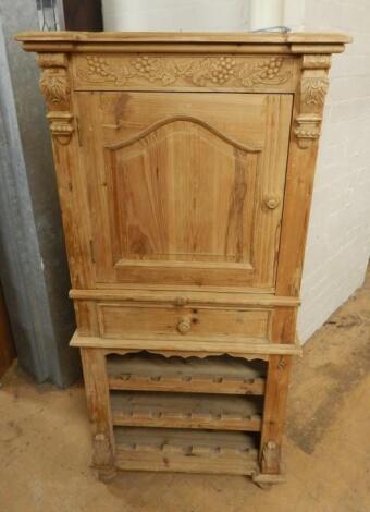 A pine wine cabinet