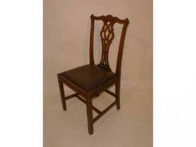 A set of six Chippendale design dining chairs