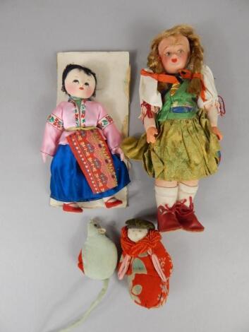 Two oriental style costume dolls