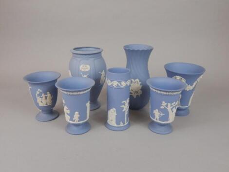 Seven Wedgwood blue Jasperware vases