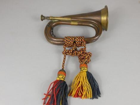 A brass and copper bugle