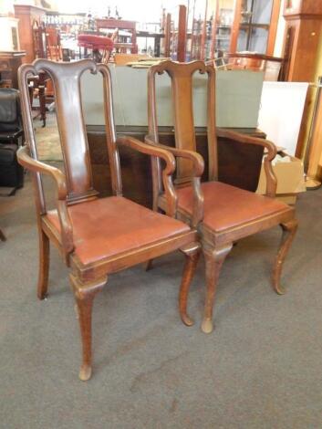 A pair of Edwardian mahogany open armchairs