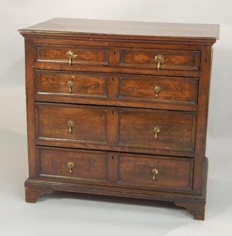 An oak chest of drawers