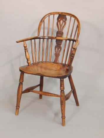 A 19thC ash and elm Windsor armchair