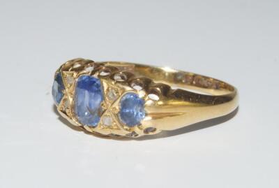 An 18ct gold three stone ring