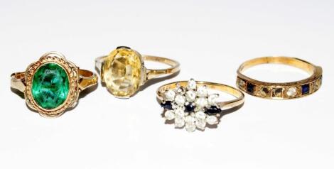 Four 9ct gold dress rings.