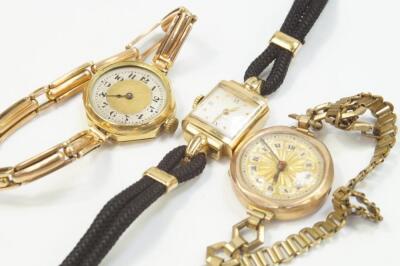 Three mid 20thC ladies' gold cased watches.