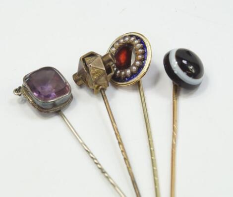 A Victorian bull's eye agate stick pin