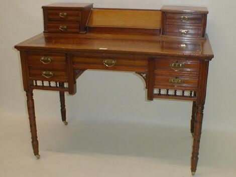 A Jas. Shoolbred & Co. walnut occasional table