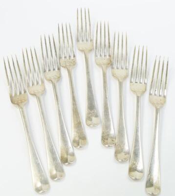 A set of nine George V silver table forks