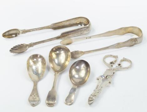 A pair of George III silver sugar tongs