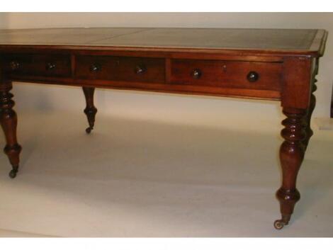 A Victorian mahogany library table