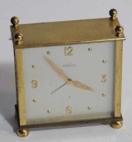 A modern gilt metal timepiece by Angelus