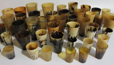 A collection of 19thC Scottish and Irish horn beakers and cups. (41)