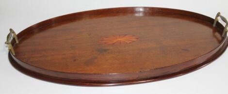 A 19thC Sheraton mahogany oval serving tray