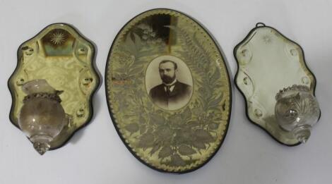 A pair of Victorian faceted glass wall mirrors