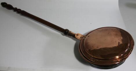 A 19thC copper warming pan