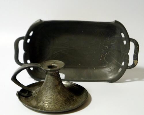 An Art Nouveau pewter two handled dish