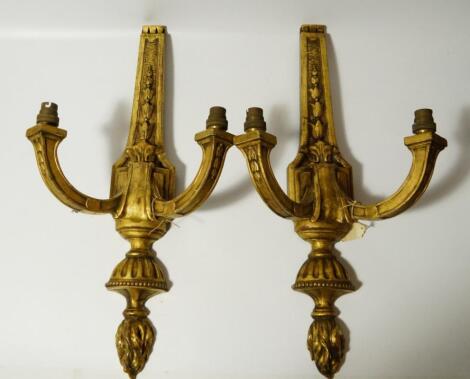 A pair of Neo-Classical design giltwood wall lights