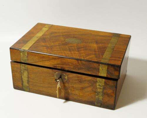 A Victorian brass bound walnut writing box