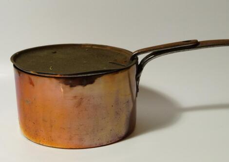 A Victorian copper saucepan and cover