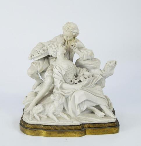 An 18thC Sevres biscuit group of two lovers eating grapes