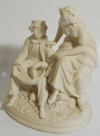 A 19thC Parian figure group of a boy and a girl