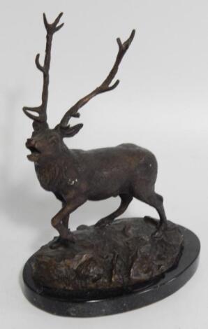 A bronze model of a stag