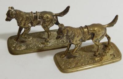 Two late 19thC cast nickel dogs