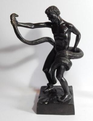 A bronze figure of a classical style nude male