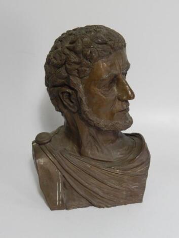 A bronze patinated white metal bust of a Roman senator