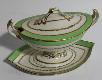 An early 19thC Derby porcelain sauceboat on stand