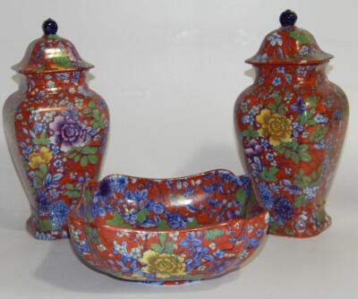 An Edwardian garniture of Cauldon pottery