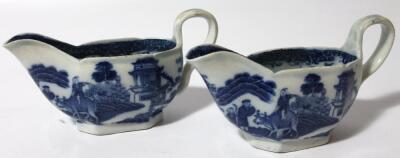 A pair of 18thC English blue and white porcelain sauceboats