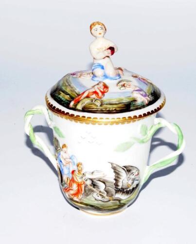 An early 20thC Naples Capo di Monte porcelain lidded chocolate cup